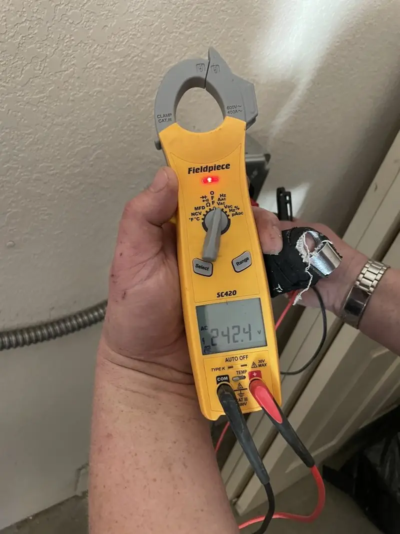 Voltage testing with clamp meter during Circuit Breaker Repair in Chillum